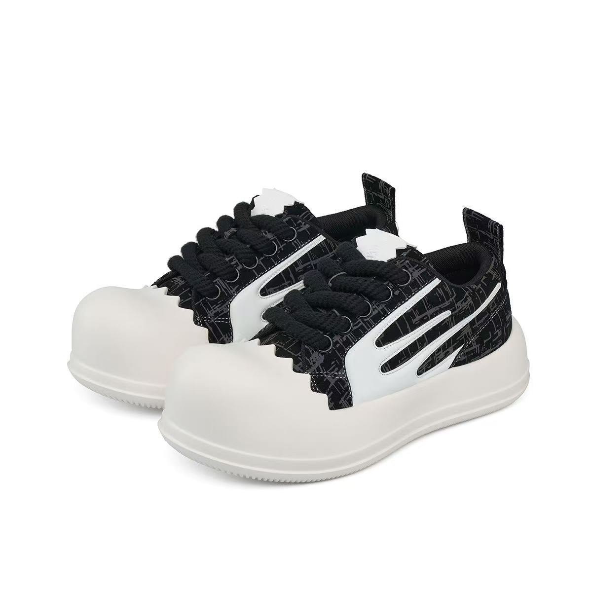 AstroPod 3M Reflective pair with black patterned uppers, white side accents and off-white soles, arranged at an angle to show the fronts and sides.
