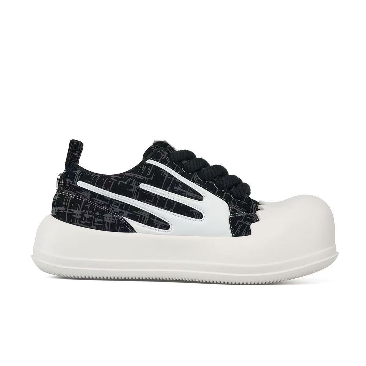 Opposite side of the AstroPod 3M Reflective sneaker with black patterned uppers, white side accents and off-white soles, toe pointing right.