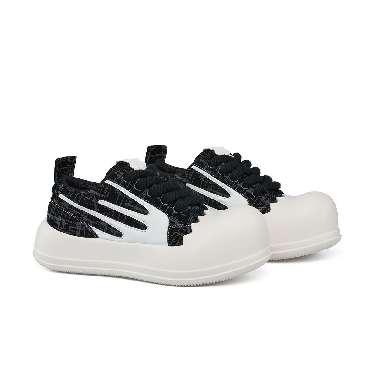 AstroPod 3M Reflective pair with black patterned uppers, white side accents and off-white soles, arranged at an angle to show the fronts and sides.