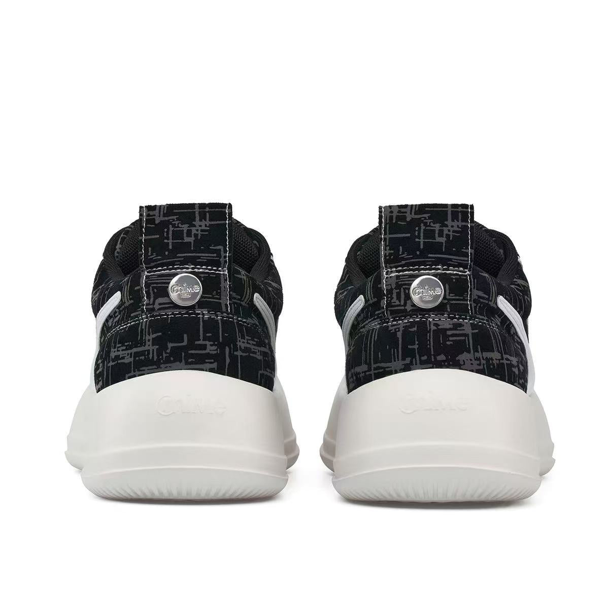 3M Reflective AstroPod pair seen from behind, with black patterned heels and off-white soles.