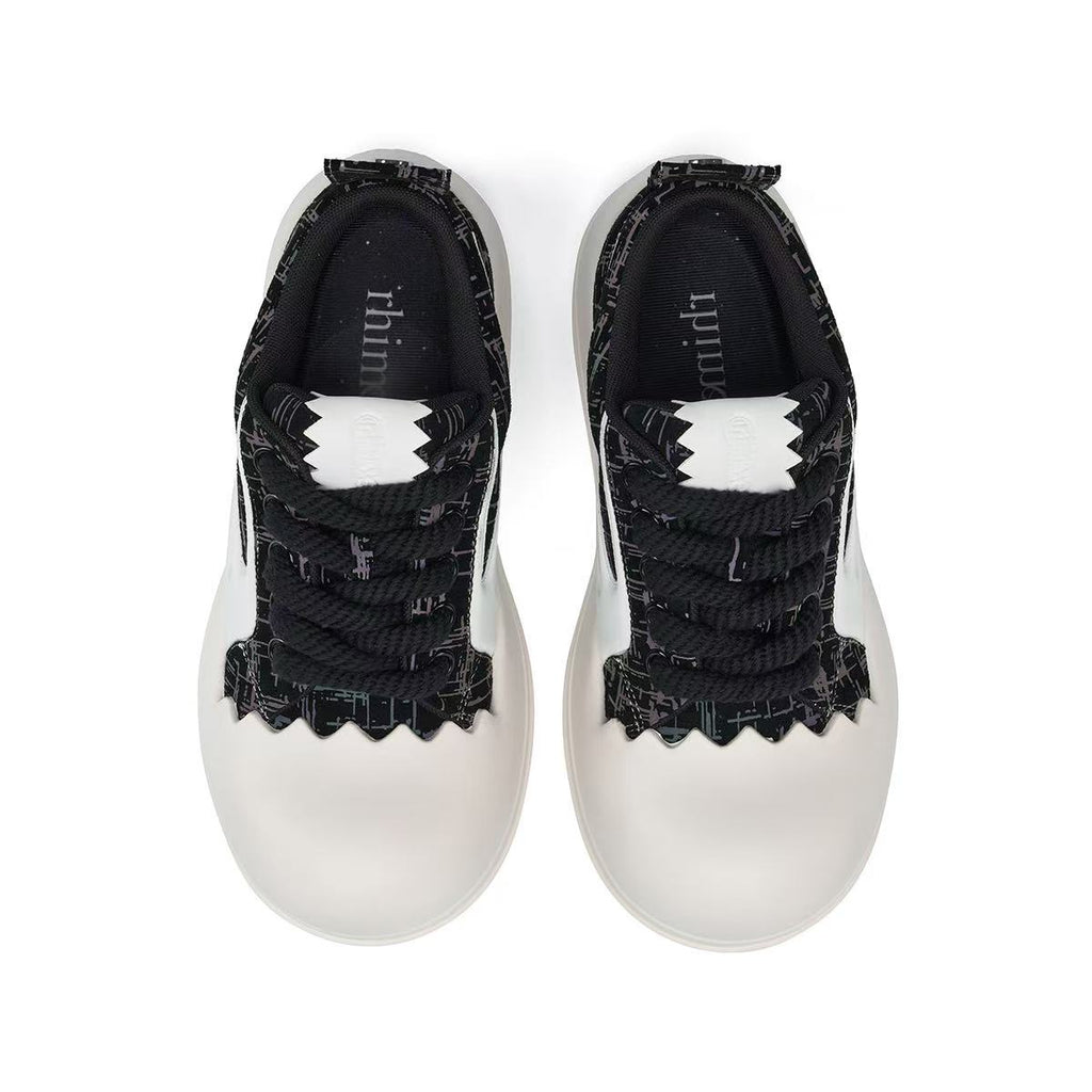 AstroPod 3M Reflective pair viewed from above, showing the black laces, tongues and white toe caps.