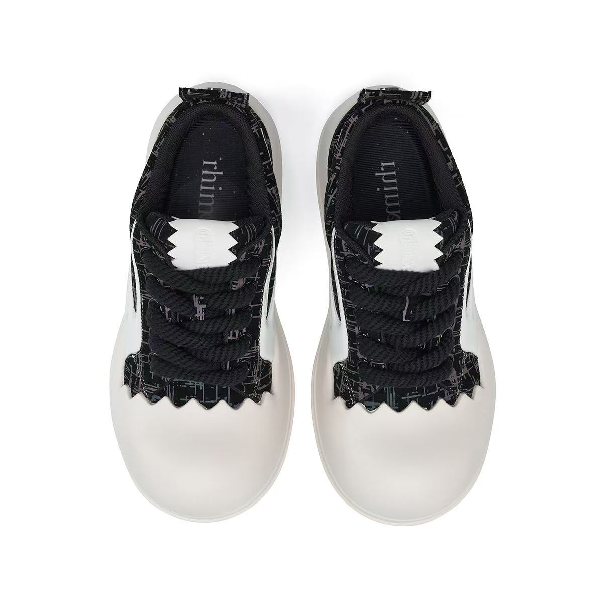 AstroPod 3M Reflective pair viewed from above, showing the black laces, tongues and white toe caps.