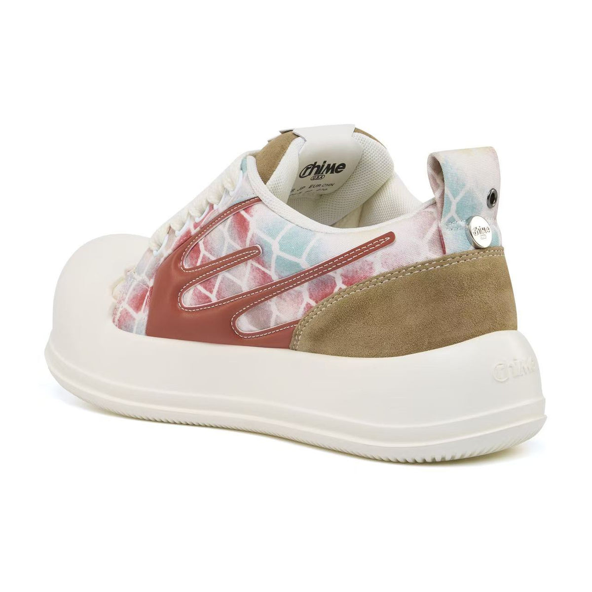 AstroPod Babyface Ray Wavy sneaker with pastel-patterned uppers, brown side accents and white soles, viewed at an angle from the heel and side.