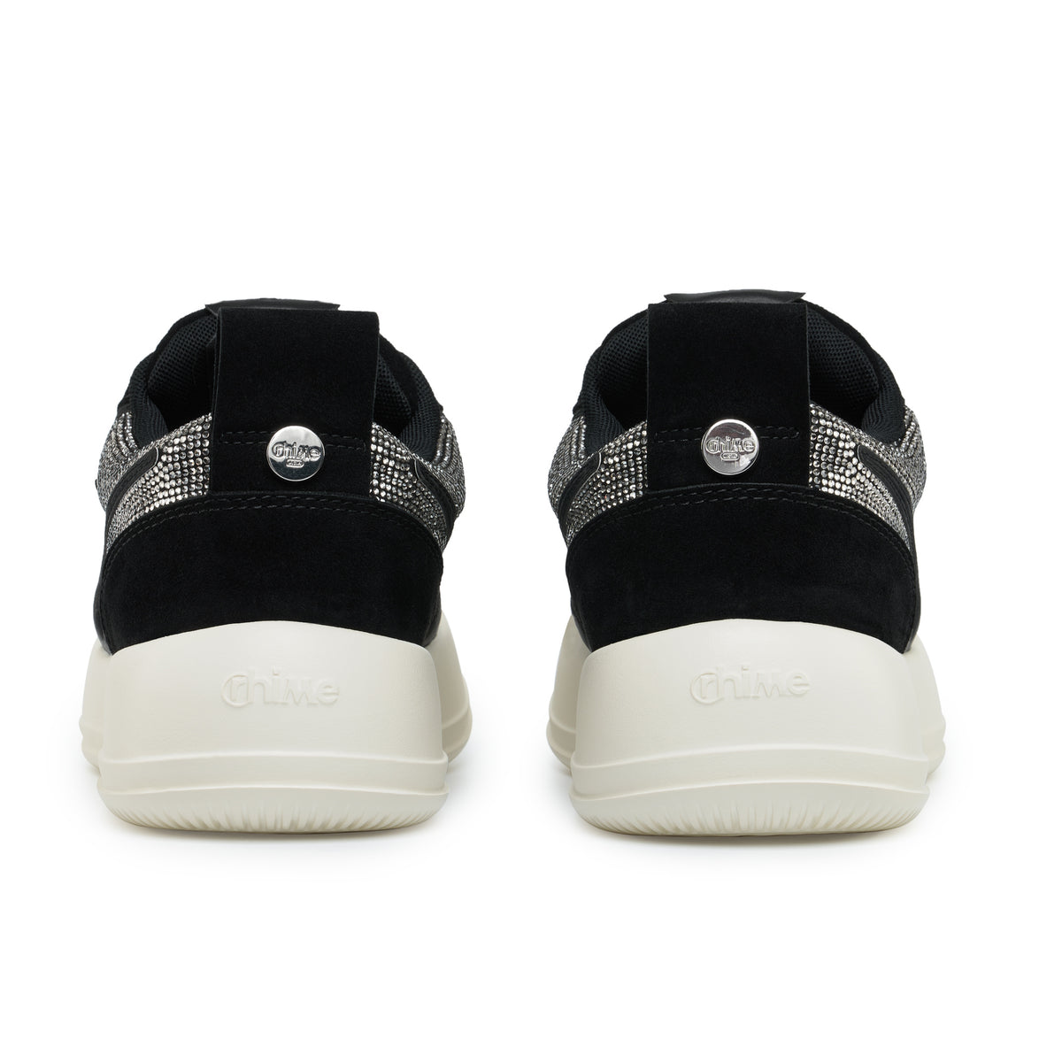 Black Rhinestone Onyx AstroPod pair seen from behind, with black heels, silver-tone trim and off-white soles.