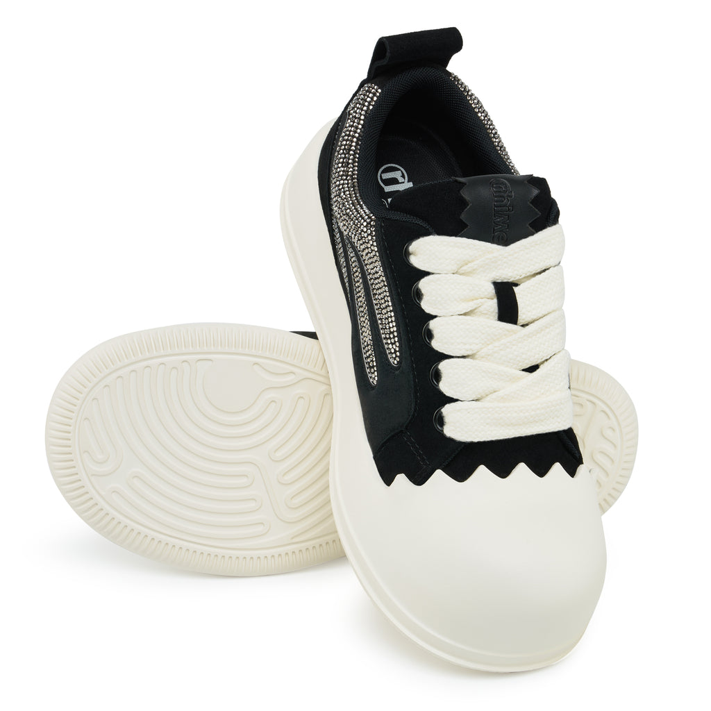 AstroPod Black Rhinestone Onyx sneakers with black uppers, silver-tone rhinestones and off-white soles, arranged to show the laces and grooved underside.