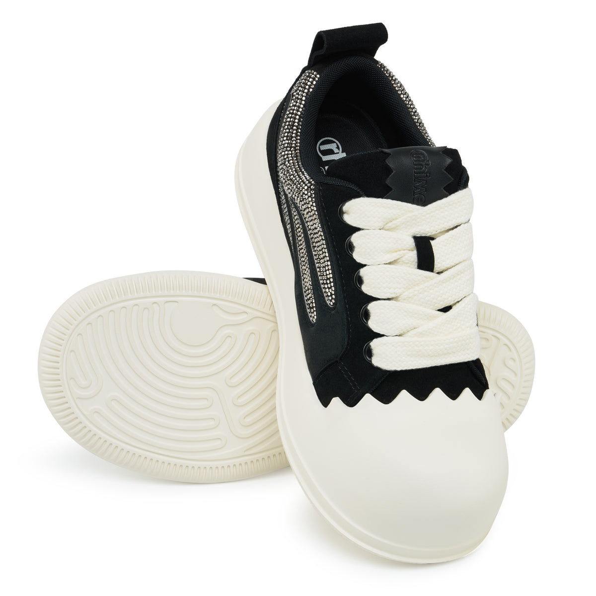 AstroPod Black Rhinestone Onyx sneakers with black uppers, silver-tone rhinestones and off-white soles, arranged to show the laces and grooved underside.