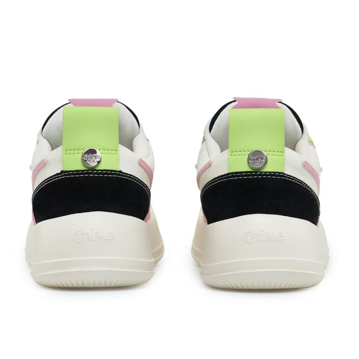 Cosmic Bubble AstroPod pair seen from behind, with black heel panels, lime green tabs and white soles.