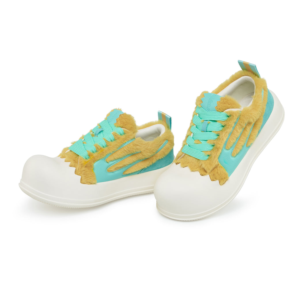 AstroPod DeJ Loaf Yellow World pair with fluffy yellow uppers, turquoise accents and white soles, arranged at an angle to show the fronts and sides.