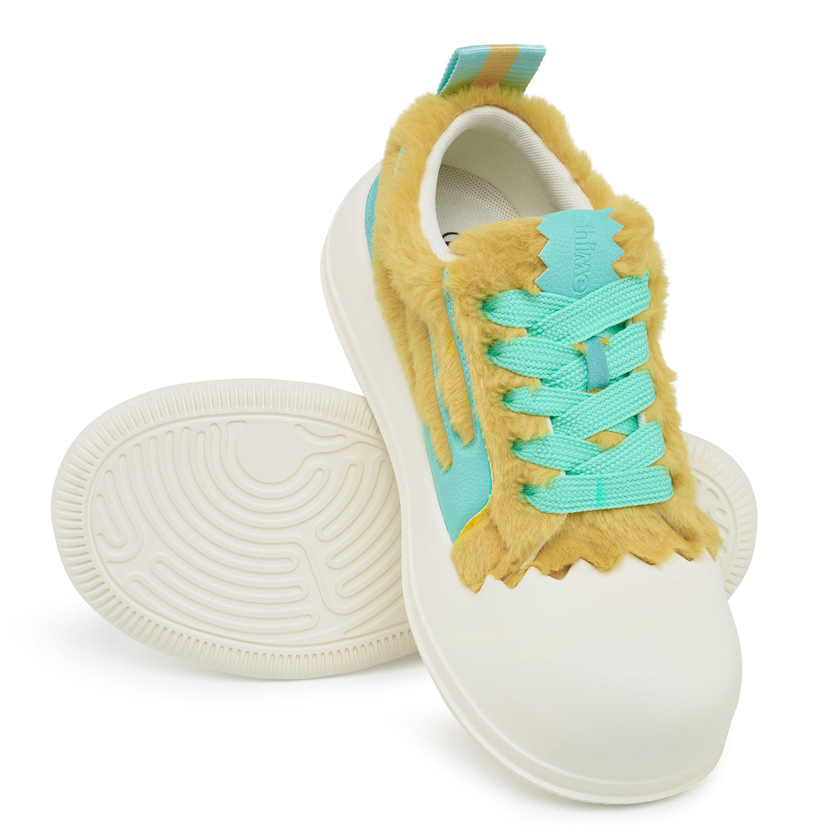 AstroPod DeJ Loaf Yellow World sneakers with fluffy yellow uppers, turquoise accents and white soles, arranged to show the laces and grooved underside.