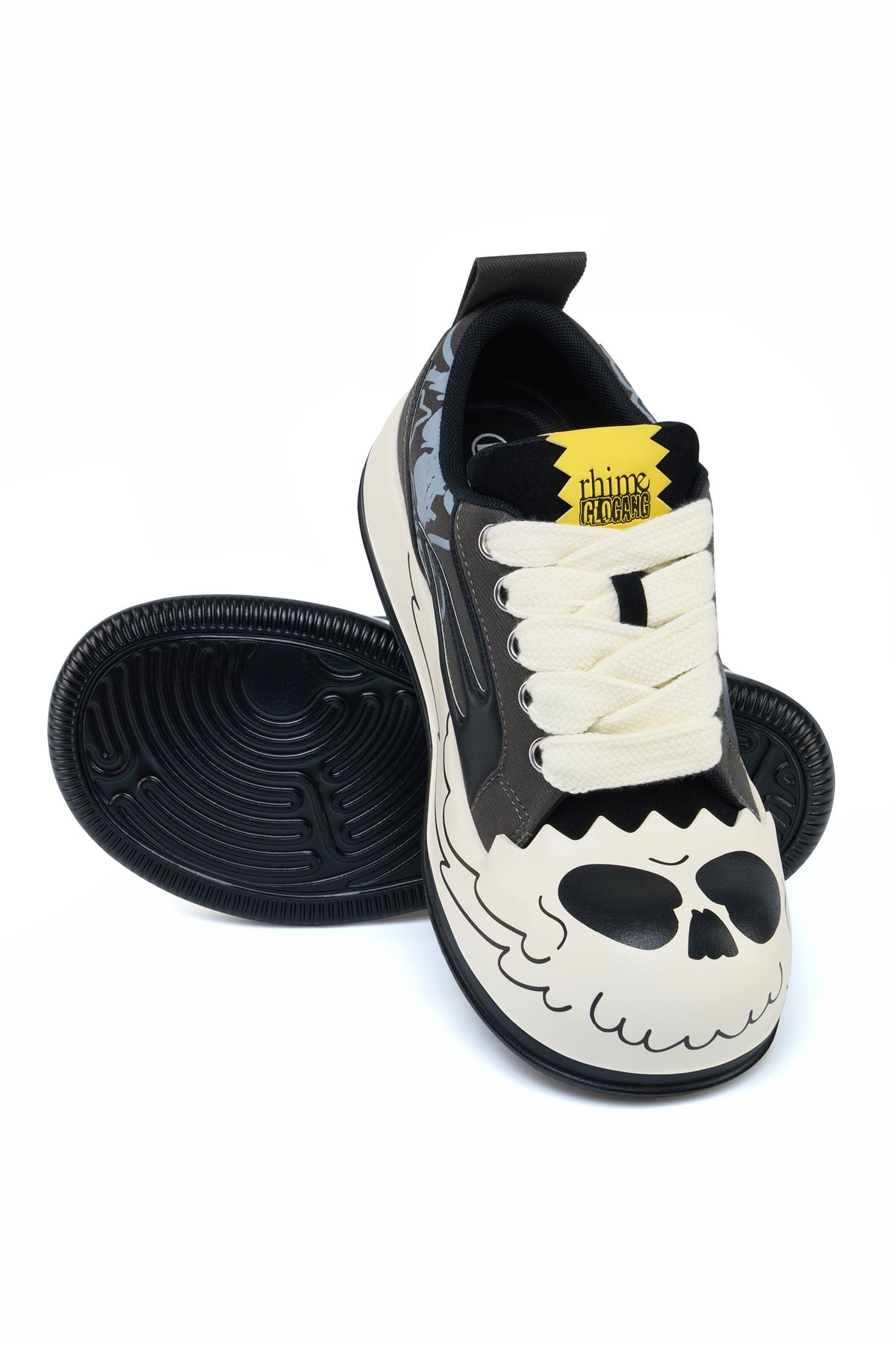 AstroPod Glo Gang sneakers with gray-and-black graphics, white laces and printed light-colored sidewalls, arranged to show the laces and grooved underside.
