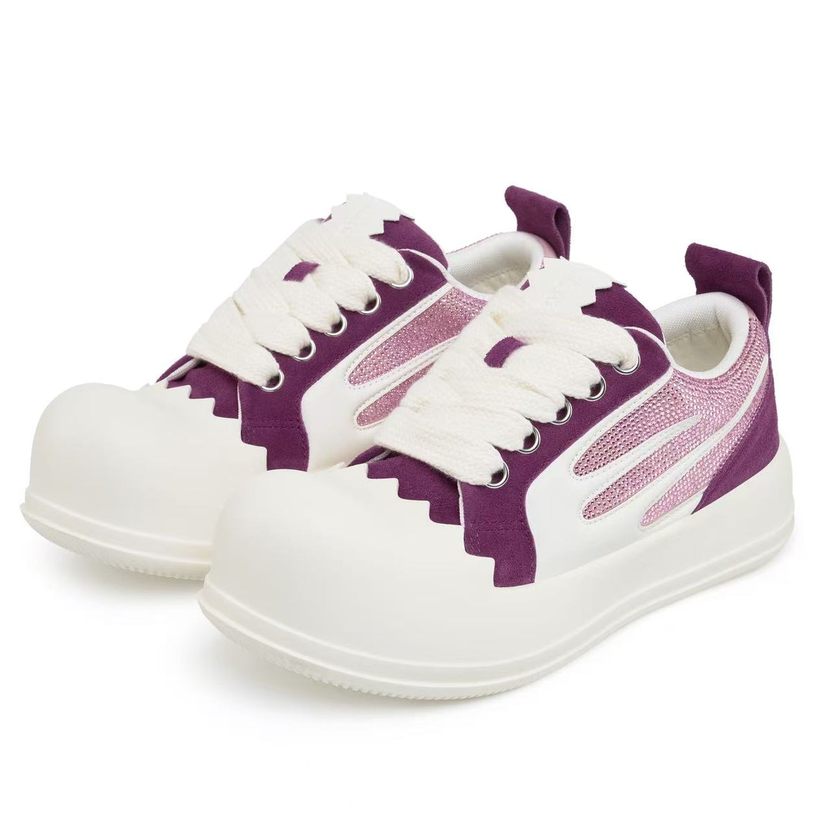 AstroPod Purple Rhinestone Amethyst pair with purple uppers, pink-toned rhinestones and off-white soles, arranged at an angle to show the fronts and sides.