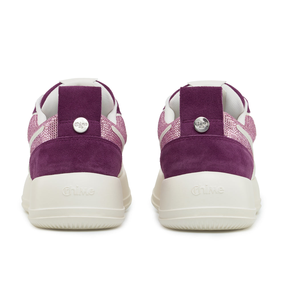 Purple Rhinestone Amethyst AstroPod pair seen from behind, with purple heels, pink-toned trim and off-white soles.