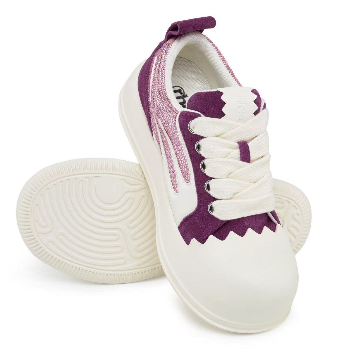 AstroPod Purple Rhinestone Amethyst sneakers with purple uppers, pink-toned rhinestones and off-white soles, arranged to show the laces and grooved underside.
